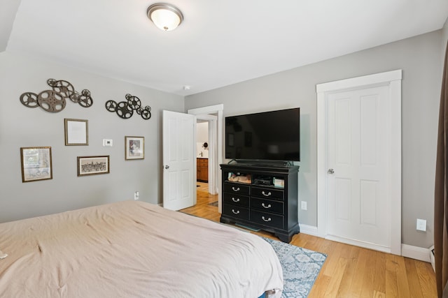 25 Searles St, Livermore Falls, ME 04254 - bedroom with light wood-style flooring and baseboards