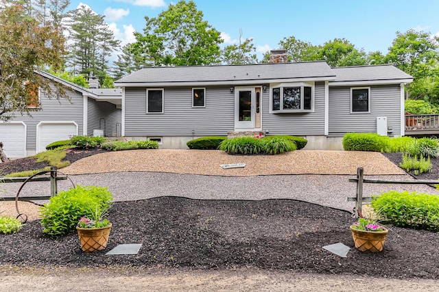 14 Old County Rd, South Berwick, ME 03908 - ranch-style home with a chimney and an attached garage
