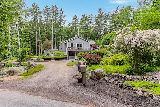 14 Old County Rd, South Berwick, ME 03908 - view of front of property featuring a deck, a chimney, and dirt driveway