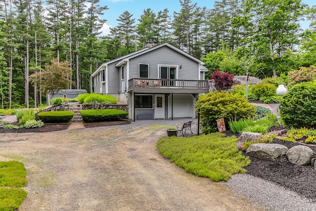 14 Old County Rd, South Berwick, ME 03908 - view of front facade featuring driveway, a deck, and an attached garage