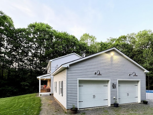 66 Stoney Acres Rd, Pittston, ME 04345 - view of side of home with a detached garage