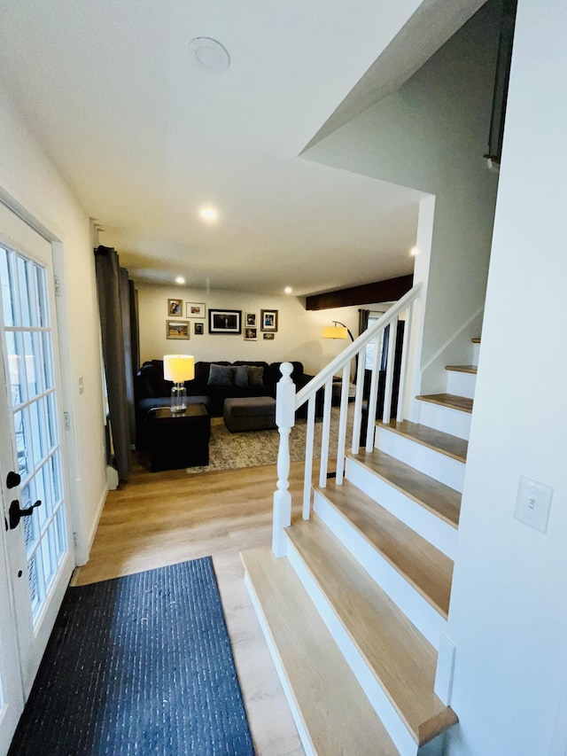 66 Stoney Acres Rd, Pittston, ME 04345 - stairs featuring wood finished floors, healthy amount of natural light, and recessed lighting