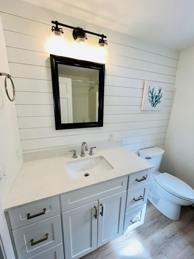 66 Stoney Acres Rd, Pittston, ME 04345 - bathroom featuring vanity, wood finished floors, and wood walls