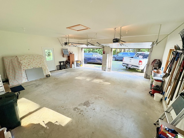 66 Stoney Acres Rd, Pittston, ME 04345 - garage featuring a garage door opener