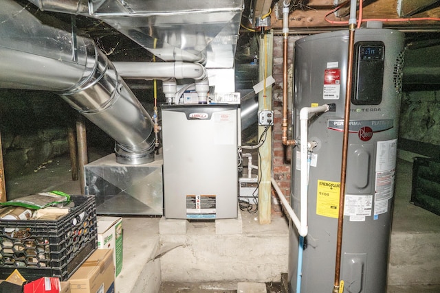 17 Green St, Dover-Foxcroft, ME 04426 - utility room featuring heat pump water heater