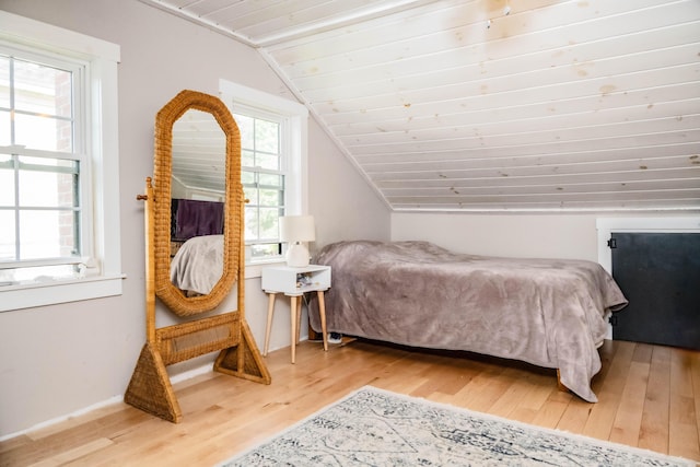 17 Green St, Dover-Foxcroft, ME 04426 - bedroom with light wood finished floors and vaulted ceiling