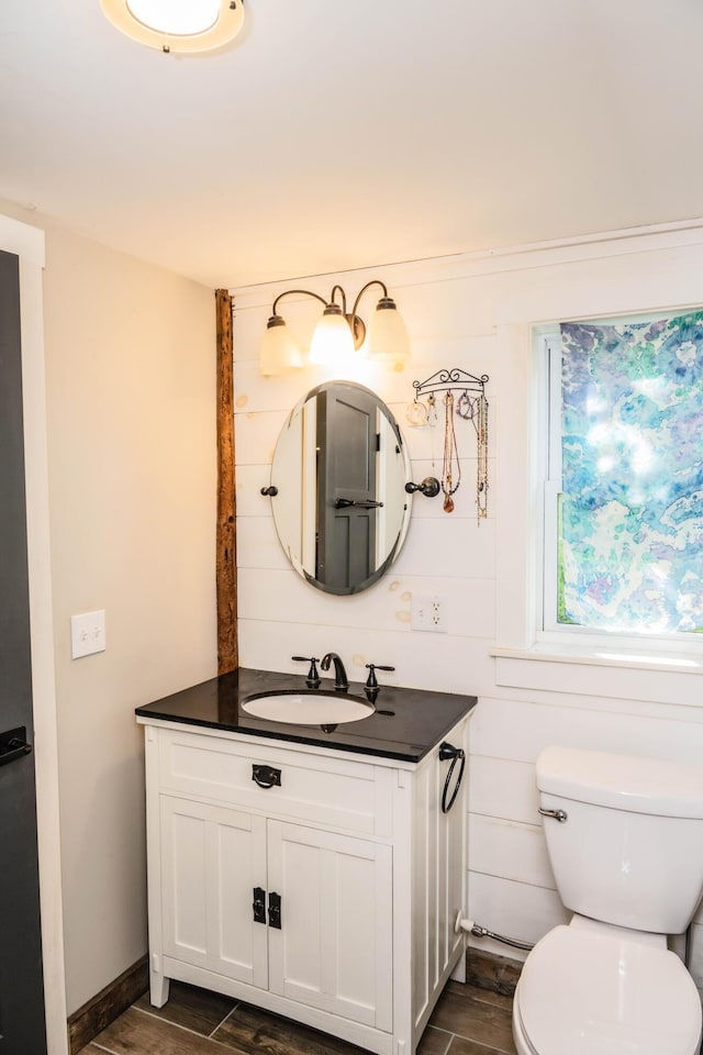 17 Green St, Dover-Foxcroft, ME 04426 - bathroom featuring vanity and wood finished floors