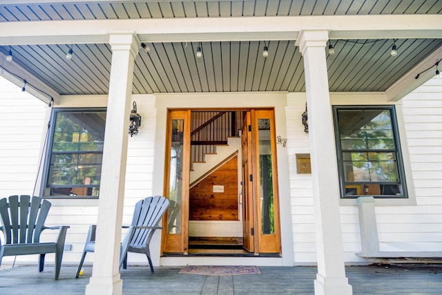 17 Green St, Dover-Foxcroft, ME 04426 - doorway to property featuring covered porch