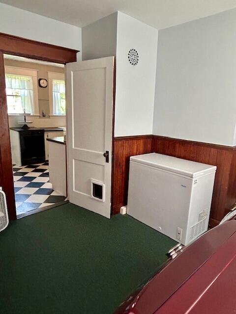 28 Holly St, Auburn, ME 04210 - interior space with wainscoting, tile patterned floors, and wooden walls