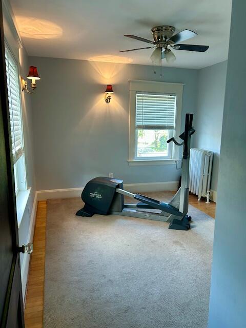 28 Holly St, Auburn, ME 04210 - exercise area with radiator, a ceiling fan, and carpet floors