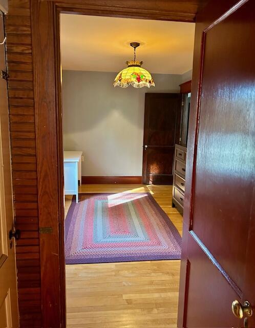 28 Holly St, Auburn, ME 04210 - hallway featuring light wood-type flooring
