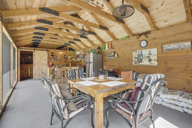 16 Keystone Spring Rd, Poland, ME 04274 - dining space featuring wood walls, wood ceiling, and light carpet