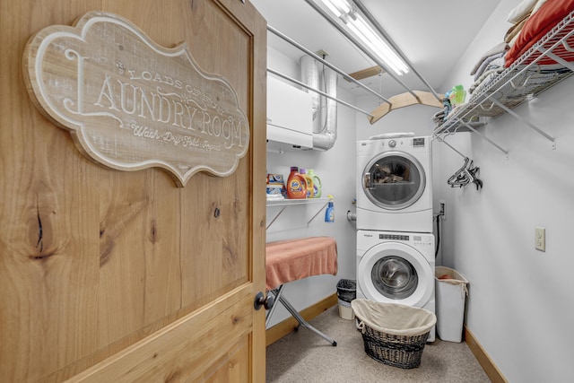 16 Keystone Spring Rd, Poland, ME 04274 - laundry room with stacked washer / dryer and baseboards