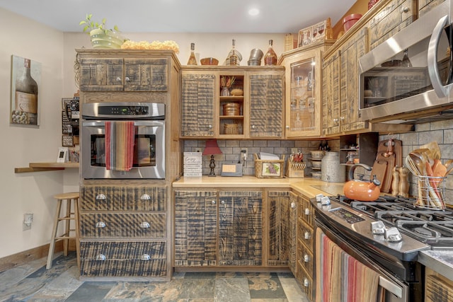 16 Keystone Spring Rd, Poland, ME 04274 - kitchen featuring stainless steel appliances, decorative backsplash, light stone finish flooring, open shelves, and recessed lighting