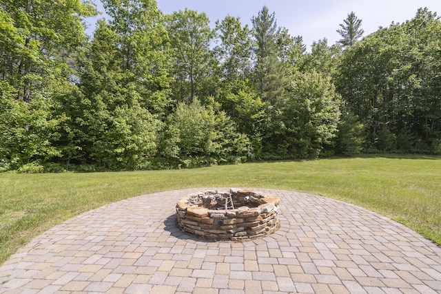 16 Keystone Spring Rd, Poland, ME 04274 - view of patio featuring an outdoor fire pit