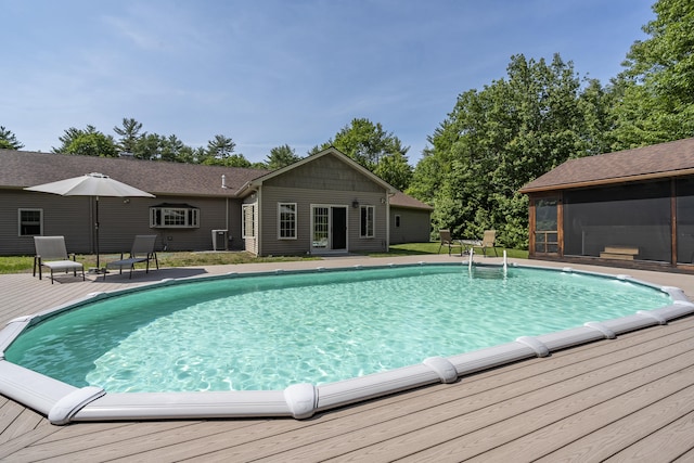 16 Keystone Spring Rd, Poland, ME 04274 - swimming pool featuring a sunroom and a wooden deck