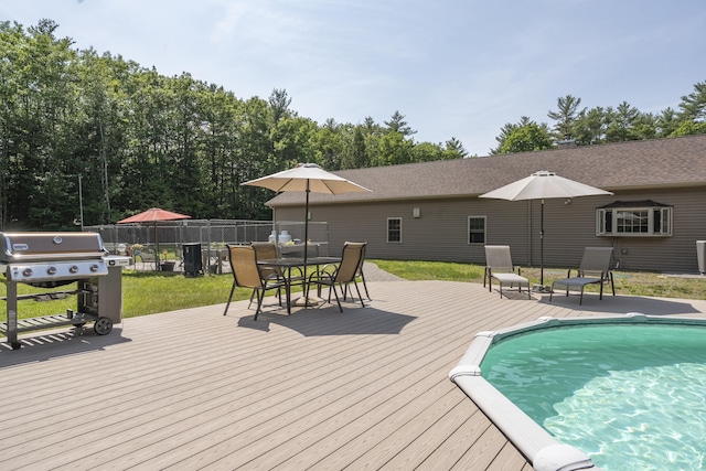 16 Keystone Spring Rd, Poland, ME 04274 - view of swimming pool with a wooden deck, area for grilling, and outdoor dining area
