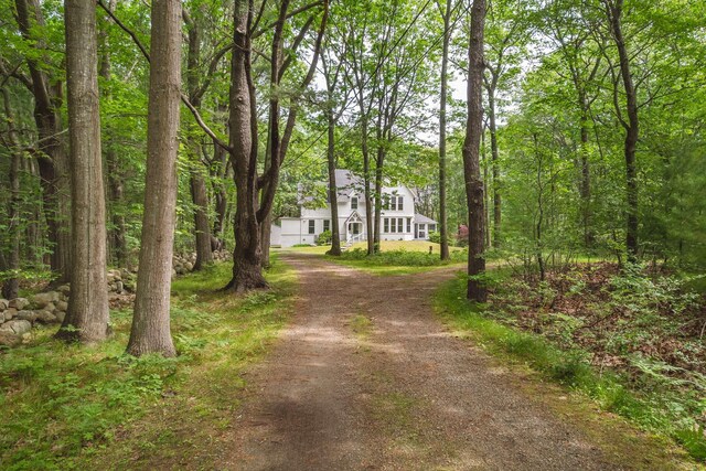 4 Fairbourne Ln, York, ME 03902 - view of front of house featuring dirt driveway and a view of trees