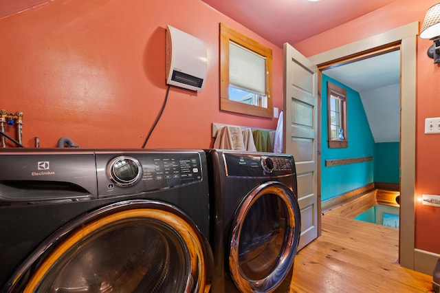 574 Mingo Loop Rd, Rangeley, ME 04970 - laundry room with hardwood / wood-style floors and washer and dryer