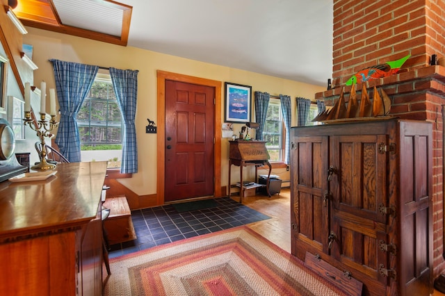 574 Mingo Loop Rd, Rangeley, ME 04970 - entryway featuring plenty of natural light and wood finished floors