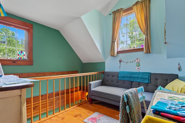 574 Mingo Loop Rd, Rangeley, ME 04970 - sitting room featuring lofted ceiling, wood finished floors, and plenty of natural light