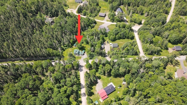 574 Mingo Loop Rd, Rangeley, ME 04970 - view of property location featuring a heavily wooded area