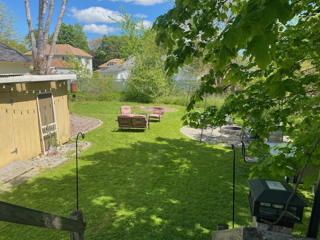 86 Summer St, Saco, ME 04072 - view of yard featuring an outdoor fire pit