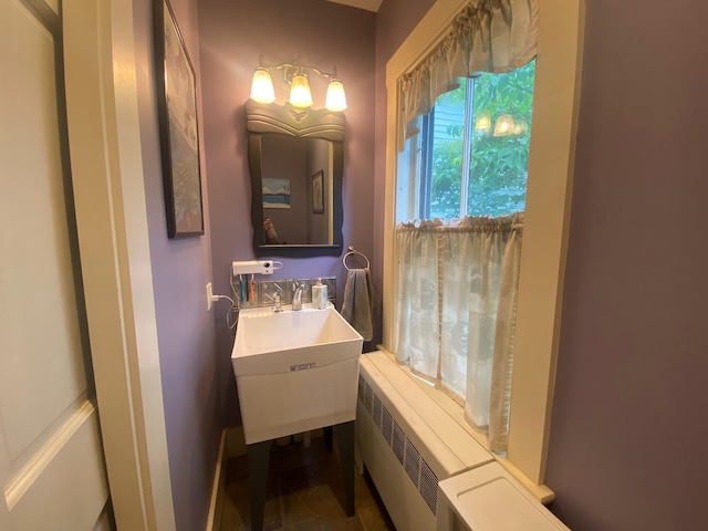 86 Summer St, Saco, ME 04072 - bathroom featuring radiator heating unit, vanity, and tile patterned flooring