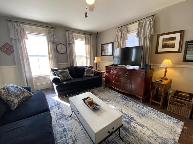 86 Summer St, Saco, ME 04072 - living area featuring healthy amount of natural light, a wainscoted wall, and ceiling fan