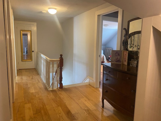 86 Summer St, Saco, ME 04072 - corridor with an upstairs landing, light wood-style floors, and radiator