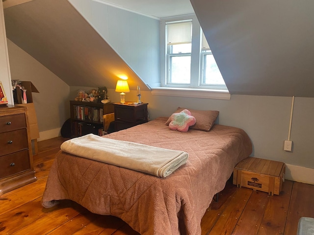 86 Summer St, Saco, ME 04072 - bedroom with hardwood / wood-style floors and vaulted ceiling