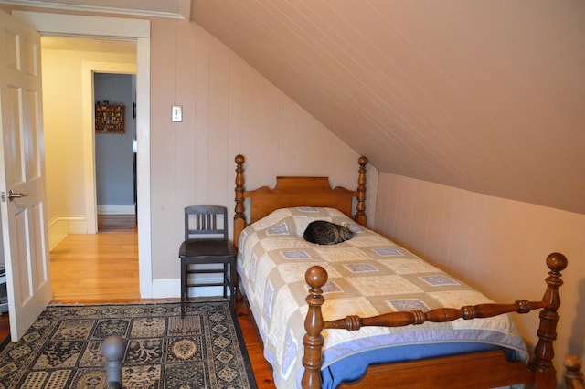 86 Summer St, Saco, ME 04072 - bedroom featuring wood finished floors and vaulted ceiling