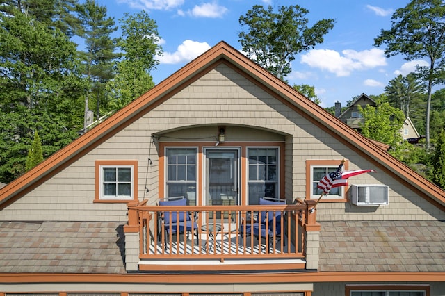 71 Village Way Unit 506, Edgecomb, ME 04556 - rear view of property with a balcony and an AC wall unit