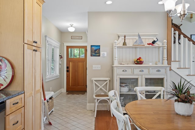 71 Village Way Unit 506, Edgecomb, ME 04556 - entryway featuring stairs, a chandelier, recessed lighting, and light tile patterned floors