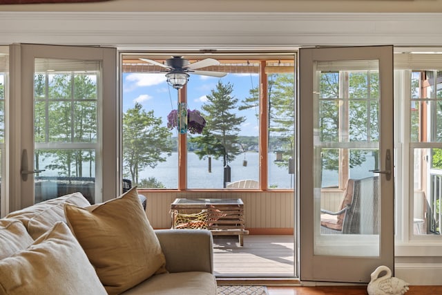71 Village Way Unit 506, Edgecomb, ME 04556 - doorway to outside with a water view, a ceiling fan, and wood finished floors