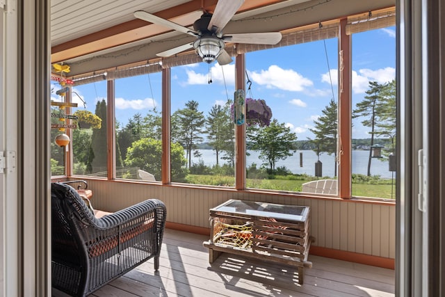 71 Village Way Unit 506, Edgecomb, ME 04556 - sunroom / solarium featuring a water view, a ceiling fan, and healthy amount of natural light