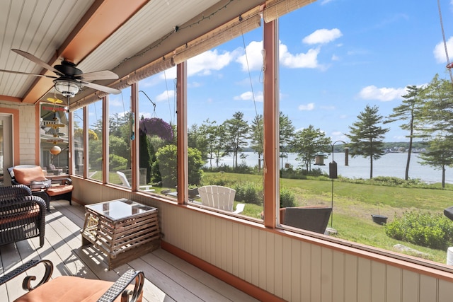 71 Village Way Unit 506, Edgecomb, ME 04556 - sunroom with a water view, ceiling fan, and healthy amount of natural light