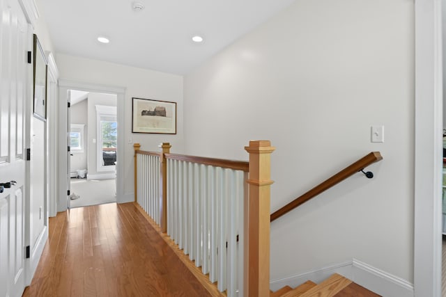 71 Village Way Unit 506, Edgecomb, ME 04556 - corridor featuring an upstairs landing, light wood-style flooring, and recessed lighting