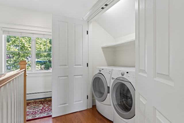 71 Village Way Unit 506, Edgecomb, ME 04556 - washroom with baseboard heating, independent washer and dryer, and wood finished floors