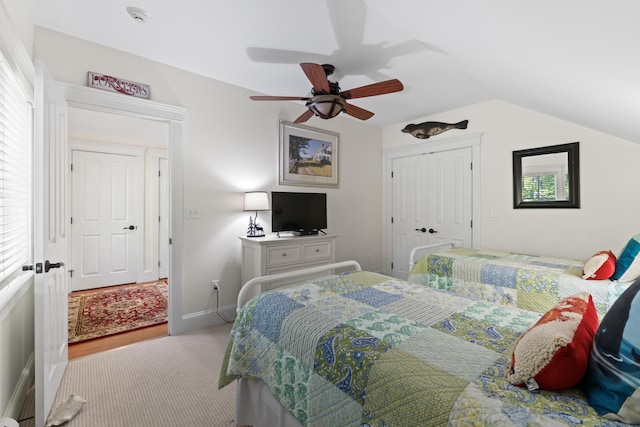 71 Village Way Unit 506, Edgecomb, ME 04556 - bedroom with carpet floors, ceiling fan, lofted ceiling, and a closet