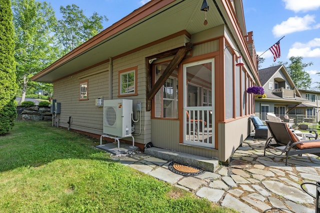 71 Village Way Unit 506, Edgecomb, ME 04556 - view of home's exterior featuring a cooling unit and a yard