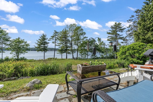 71 Village Way Unit 506, Edgecomb, ME 04556 - view of patio / terrace featuring a water view
