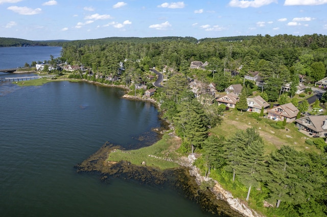71 Village Way Unit 506, Edgecomb, ME 04556 - aerial view of property's location with a heavily wooded area and a nearby body of water