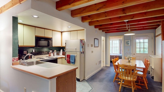 9 Cherry Ln Unit 11, Bethel, ME 04217 - kitchen featuring white appliances, recessed lighting, tasteful backsplash, light countertops, and beam ceiling