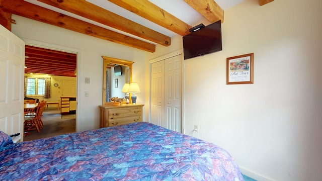 9 Cherry Ln Unit 11, Bethel, ME 04217 - bedroom with beam ceiling, carpet floors, and a closet