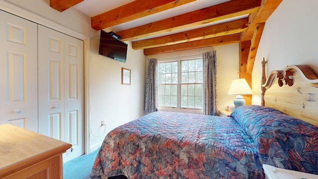 9 Cherry Ln Unit 11, Bethel, ME 04217 - carpeted bedroom with beam ceiling and a closet