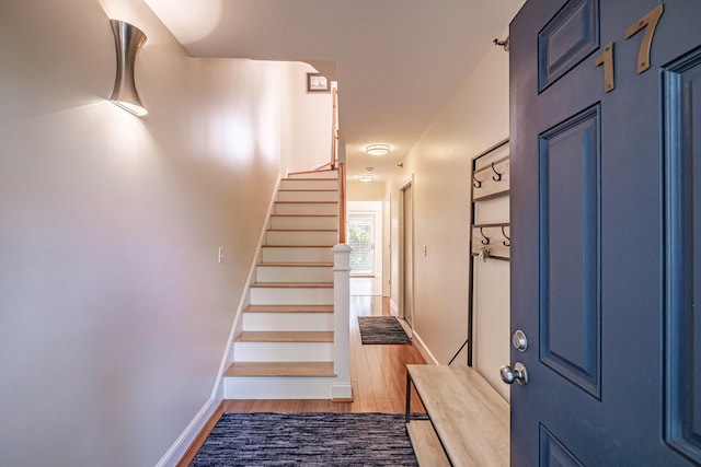 148 Breakwater Dr Unit 17, South Portland, ME 04106 - staircase featuring wood finished floors and baseboards