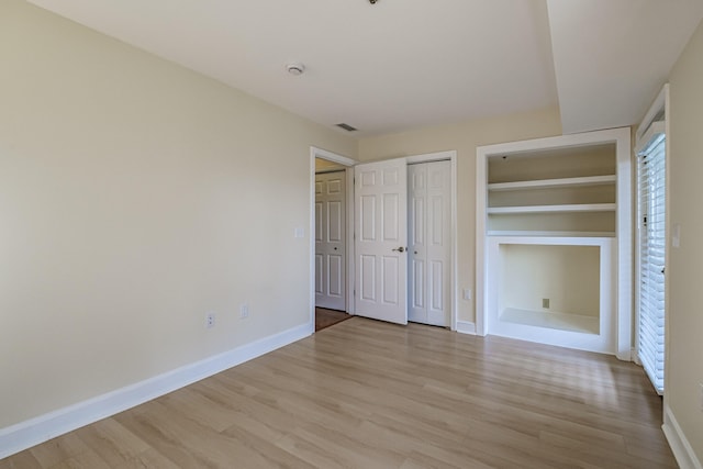 148 Breakwater Dr Unit 17, South Portland, ME 04106 - unfurnished bedroom featuring light wood finished floors and baseboards