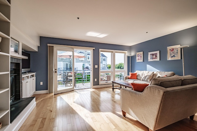 148 Breakwater Dr Unit 17, South Portland, ME 04106 - living room with light wood-type flooring and healthy amount of natural light