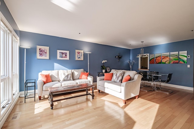 148 Breakwater Dr Unit 17, South Portland, ME 04106 - living room with light wood finished floors and baseboards